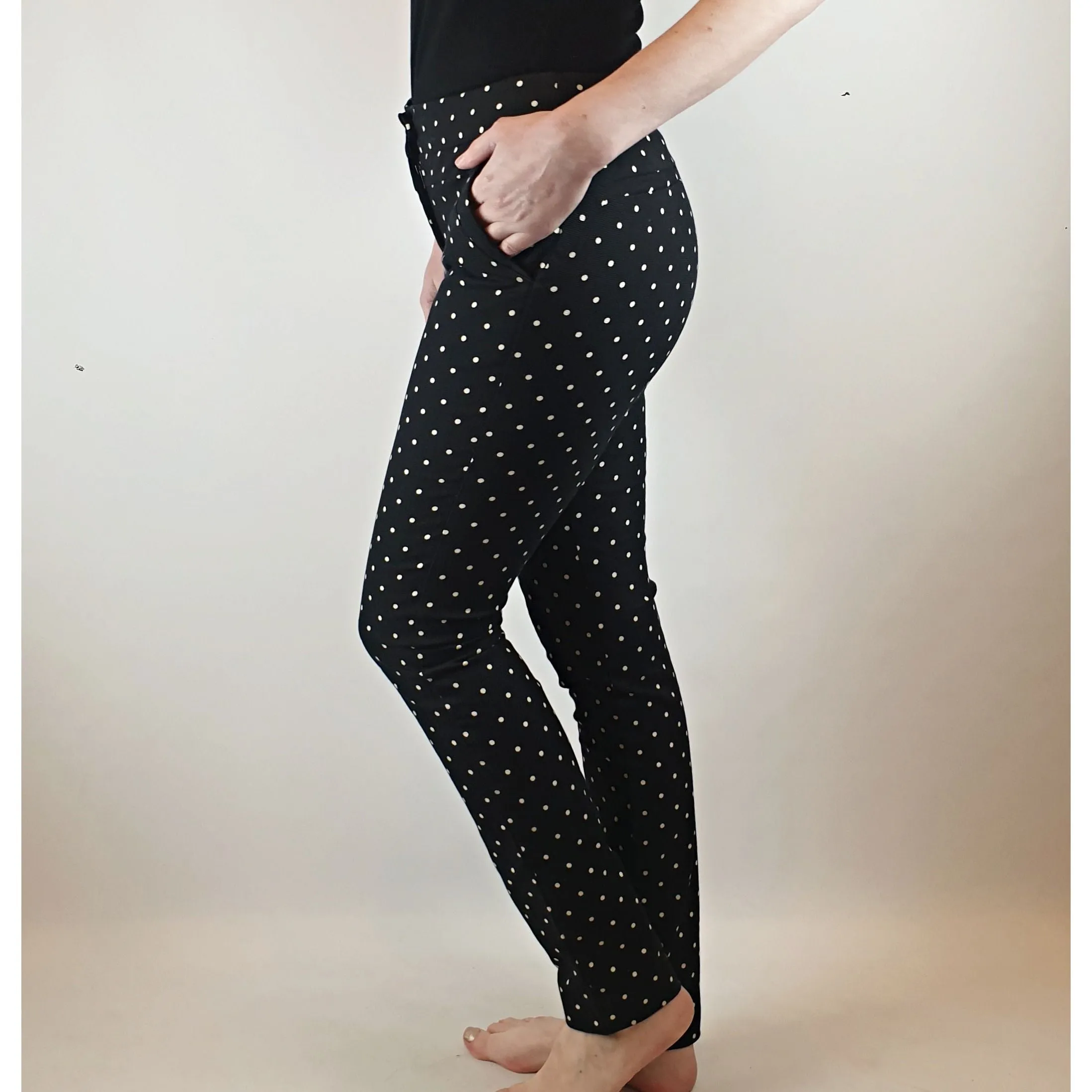 Cue black straight leg pants with white polka dots size 6