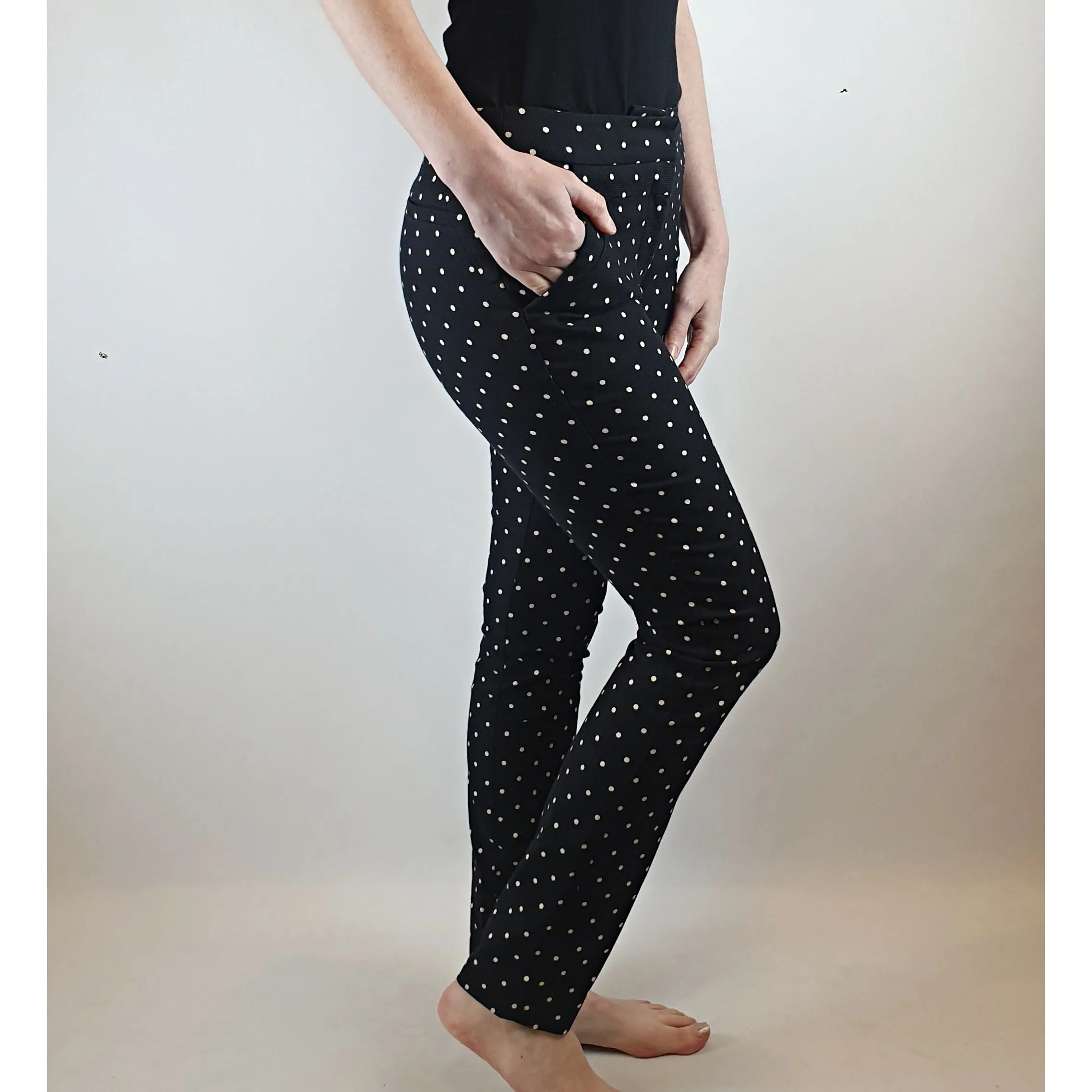 Cue black straight leg pants with white polka dots size 6