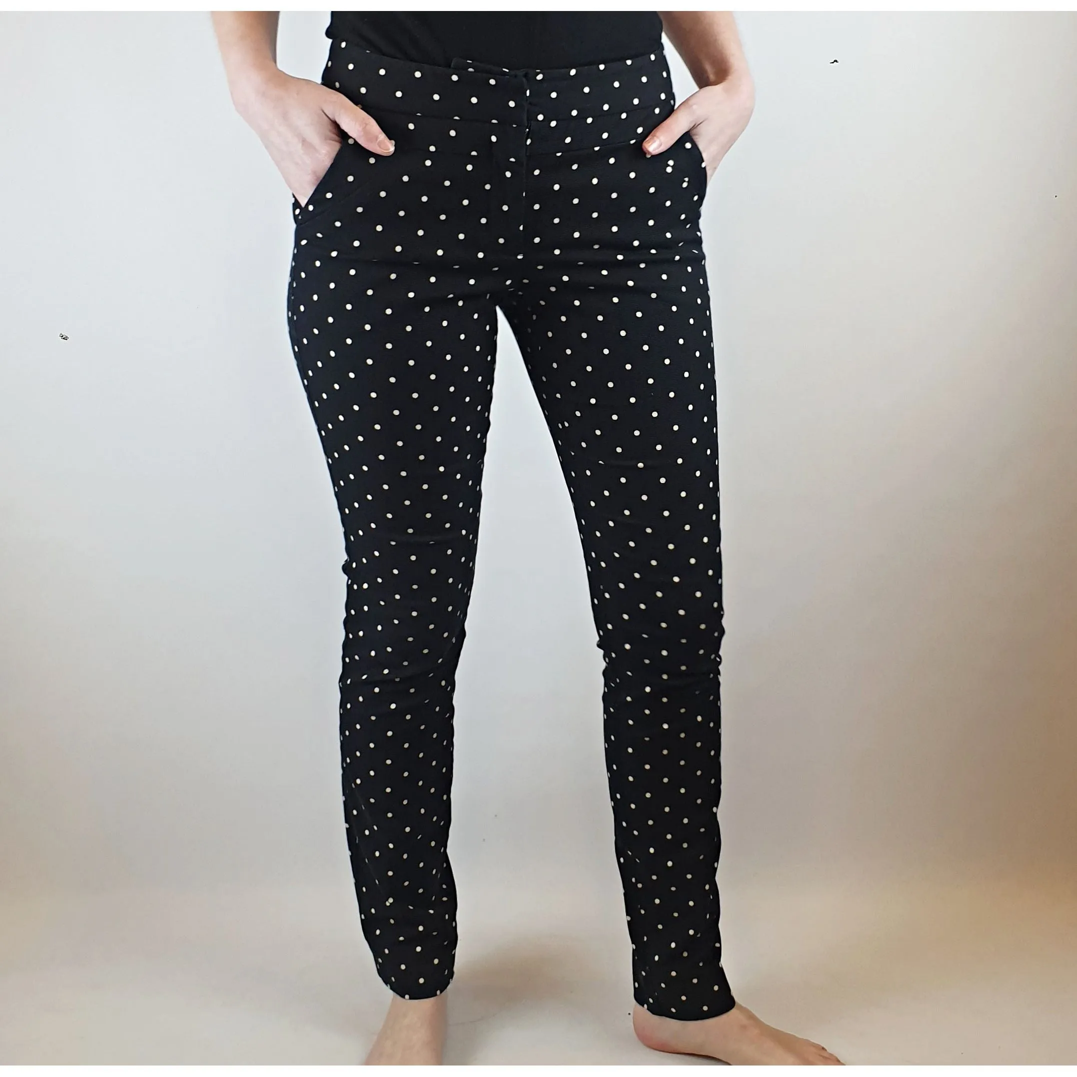 Cue black straight leg pants with white polka dots size 6