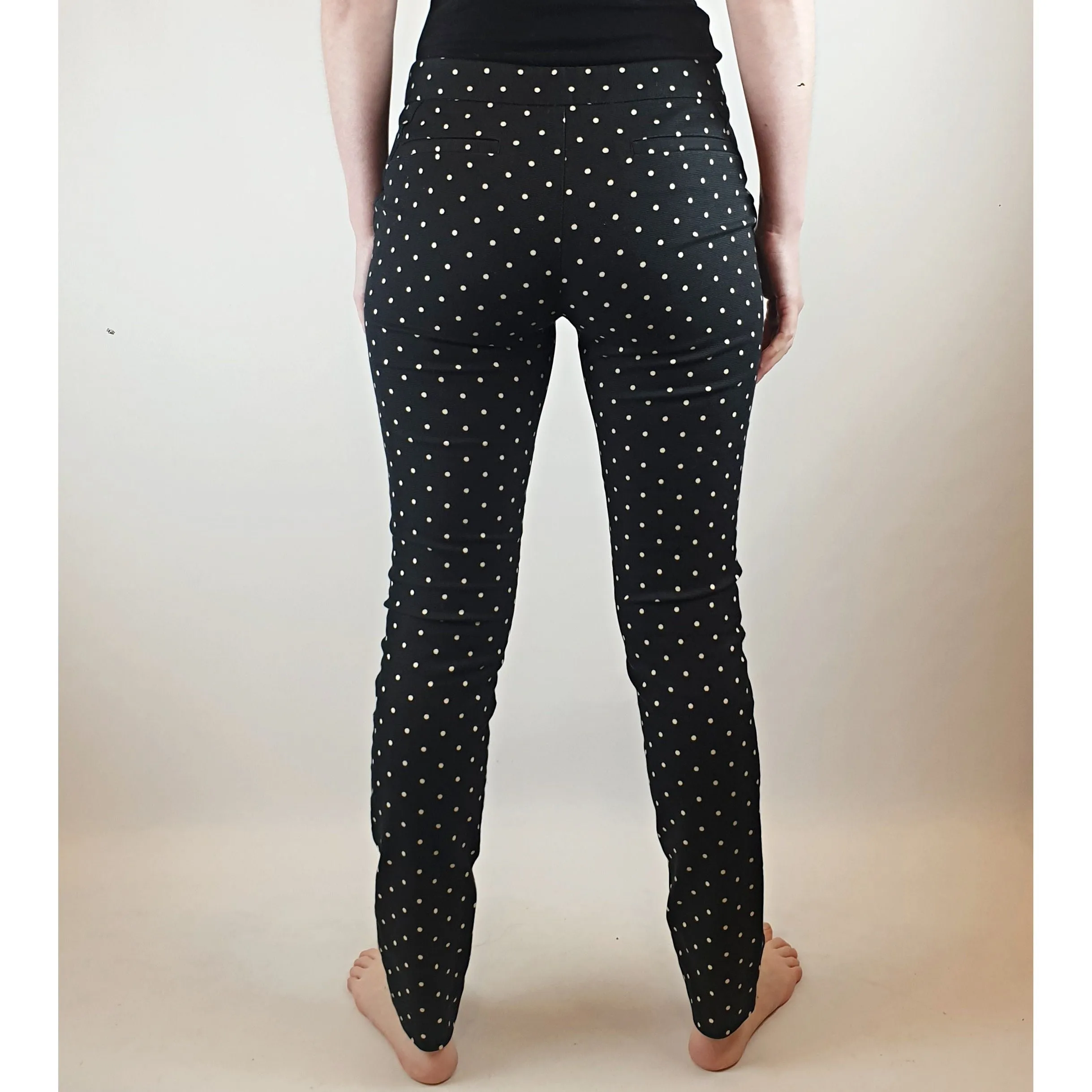 Cue black straight leg pants with white polka dots size 6