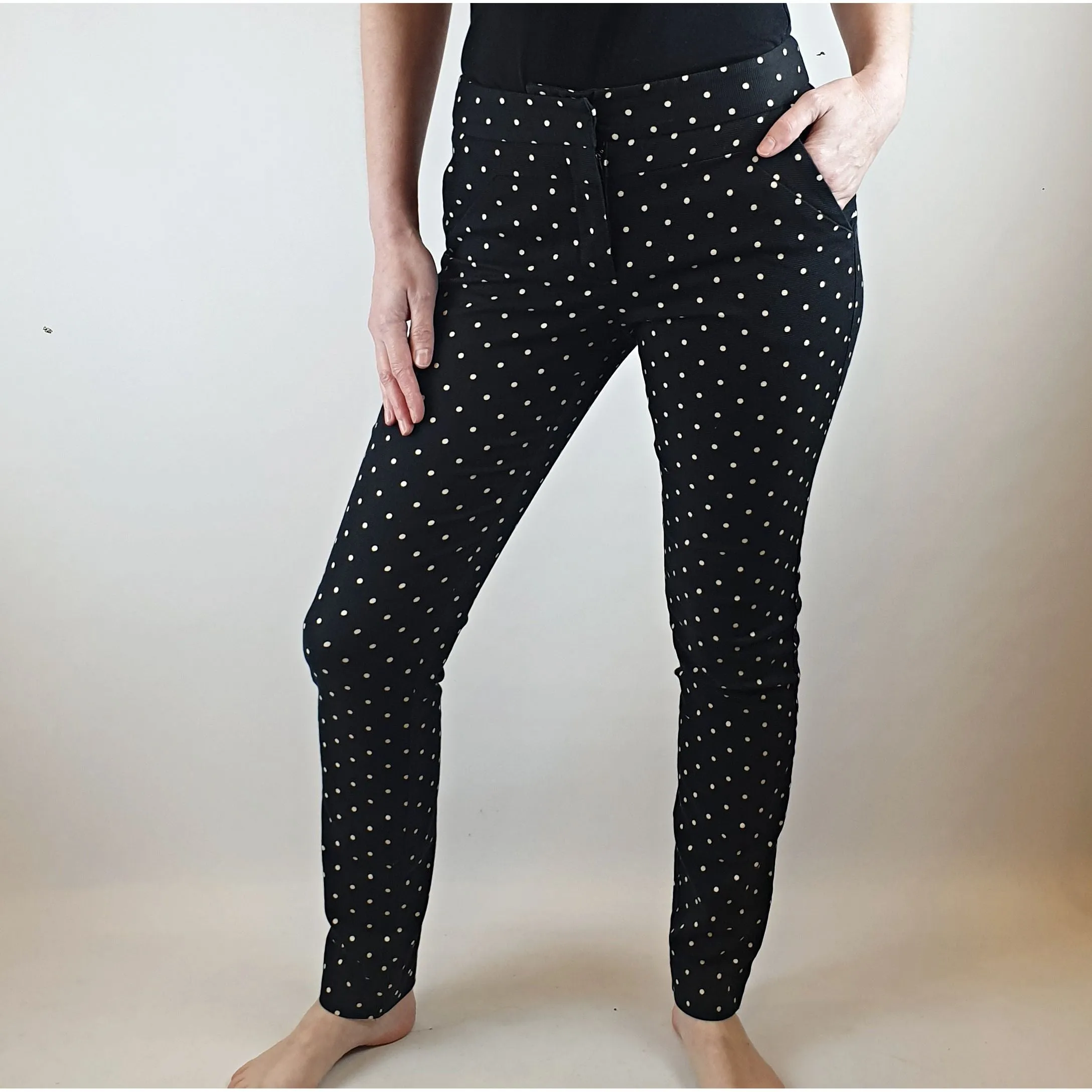 Cue black straight leg pants with white polka dots size 6
