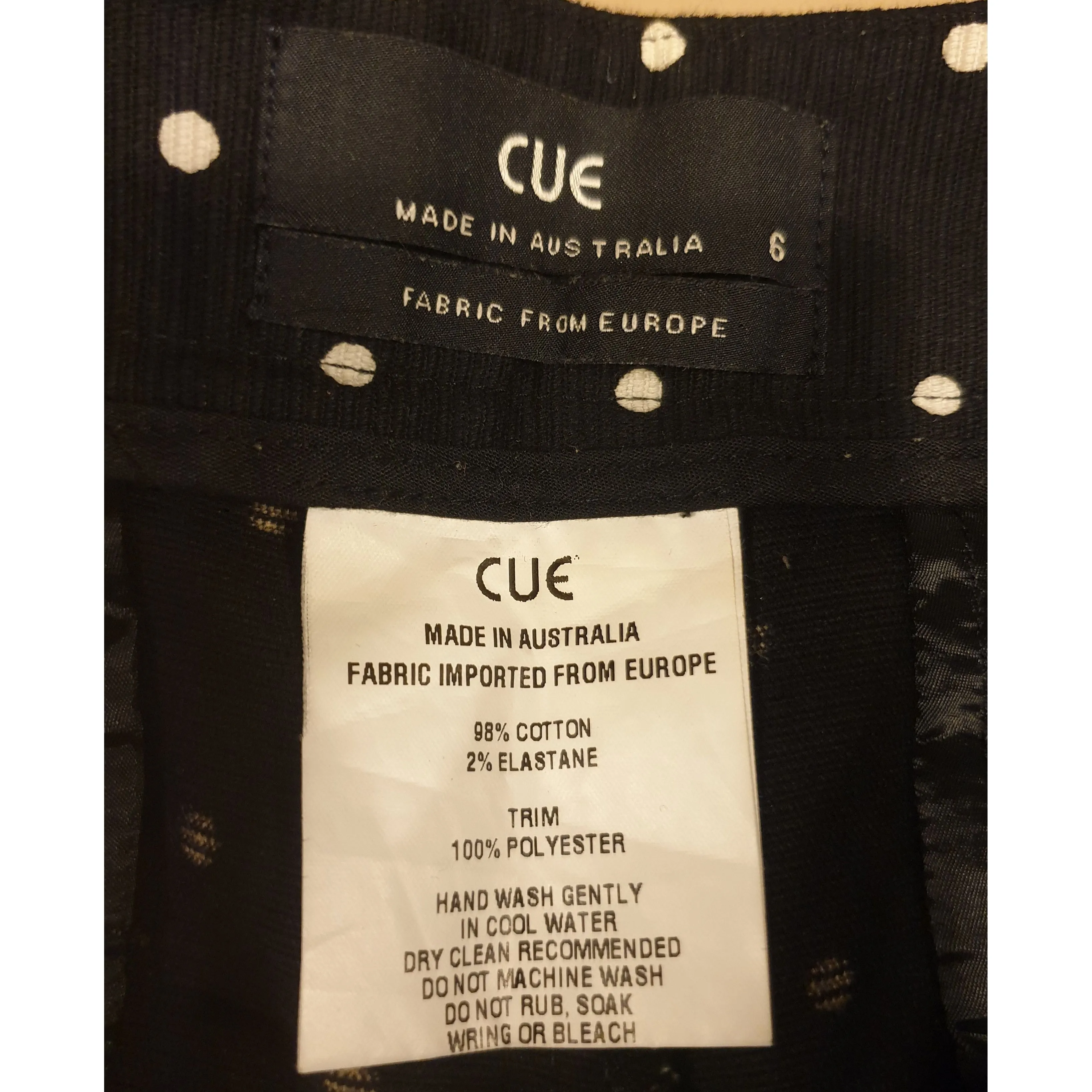 Cue black straight leg pants with white polka dots size 6