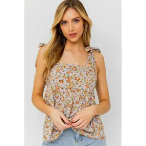 SLEEVELESS RUFFLE BOTTOM TOP