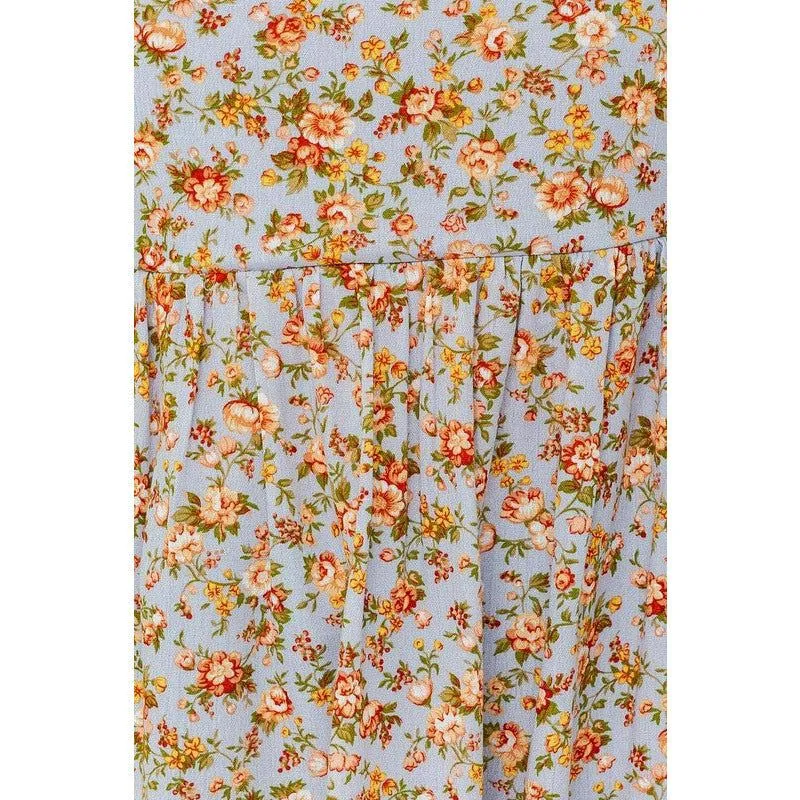 SLEEVELESS RUFFLE BOTTOM TOP