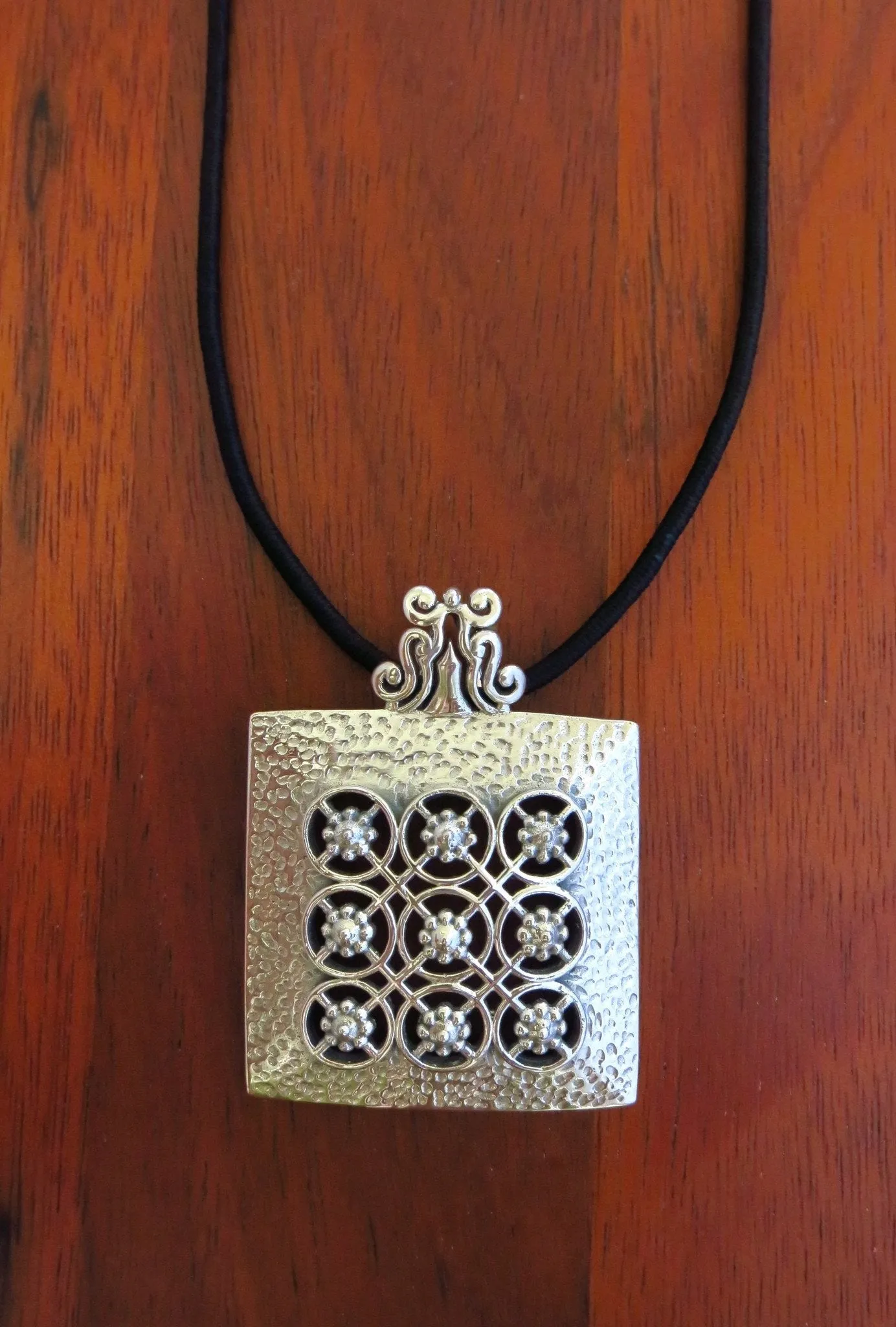Stunning, Kutch-inspired, large hammer-finish square pendant with jali